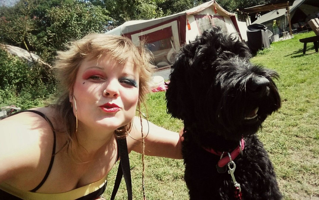 Leonie cuddling the dog